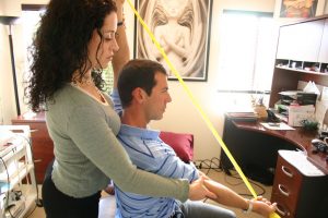 Vivie's Sports Physical Therapist rehabbing a patient